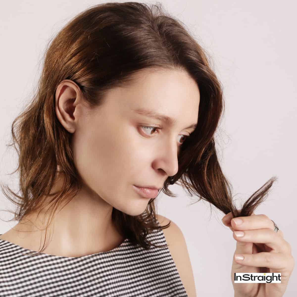 women with frizzy hair that is one of the signs of heat damaged hair